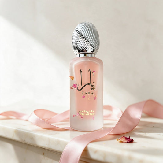 قارورة عطر الشعر يارا ٥٠ مل على رخام كريمي مع شريط وردي