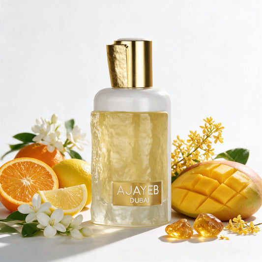 مكونات عطر عجايب دبي — البرتقال، الليمون، الياسمين، المانغو، الأوسمانثوس، العنبر